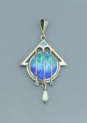 An Edwardian silver and enamelled pendant with freshwater pearl drop (by James Fenton,