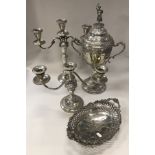 A box containing a twin-handled silver plated lidded trophy cup with blank cartouche,