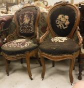Two Victorian mahogany salon chairs with needlework backs and seats,