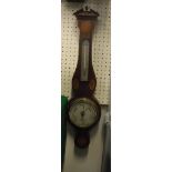 An early 20th Century mahogany and inlaid aneroid barometer/thermometer,