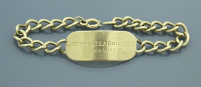 A 14 carat gold tag bracelet,