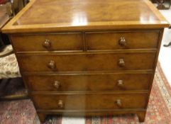 A pair of modern burr walnut and cross-banded chests of two short over three long drawers to