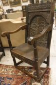 A 17th Century and later oak Wainscot style chair,