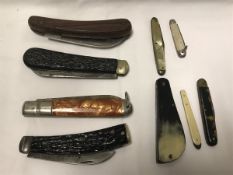 A collection of various pocket knives to include a Saynor antler handled "Real Lamb Foot",