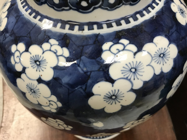 A 19th Century Chinese blue and white prunus blossom decorated baluster shaped vase and cover on a - Image 7 of 24