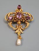 A 14 carat gold, amethyst and pearl set brooch / pendant,