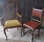 A set of four Victorian style leather dining chairs with spindle and studded backs and seats to