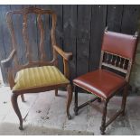 A set of four Victorian style leather dining chairs with spindle and studded backs and seats to