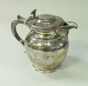 A George V silver hot water jug of small proportions,