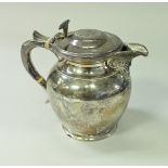 A George V silver hot water jug of small proportions,