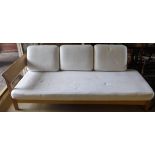 A Habitat oak framed day bed with cushions