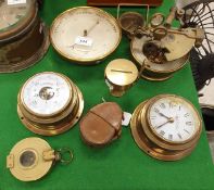 A brass framed holosteric barometer with silvered dial by TB Winter of Newcastle upon Tyne together