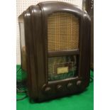 A circa 1945 bakelite cased "jelly mould" radio by Ferranti Ltd of Manchester