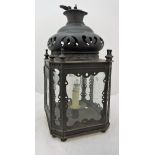 A 20th Century Middle Eastern anodised brass hall lantern in the Islamic taste