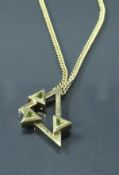 A 9 carat gold geometric design pendant set with green stones, housed on a 9 carat gold chain,