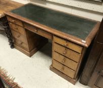 A 19th Century birdseye maple veneered kneehole desk,