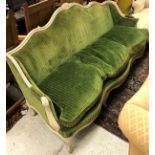 A 19th Century French painted framed sofa in the Louis XV style with green cord upholstery (N.B.