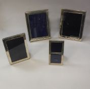 Four various modern silver photograph frames