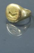 An 18 carat gold signet ring,