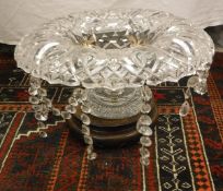 A Victorian cut glass table centre bowl on pedestal mount with plated stand raised on a Chinese