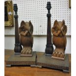 A pair of modern carved wooden "Owl" table lamps with notch carved bases and flower head decorated