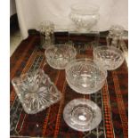A collection of various cut glass fruit bowls including one of thistle form and five others,