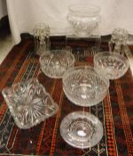 A collection of various cut glass fruit bowls including one of thistle form and five others,