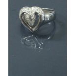 An 18 carat white gold and diamond set love heart dress ring 5 g