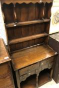 An oak dresser in the 19th Century manner of very small proportions