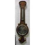 An early 20th Century mahogany cased barometer thermometer,