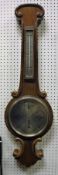 An early 20th Century mahogany cased barometer thermometer,