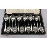A cased set of twelve George V silver "Old English" pattern tablespoons (by Emile Viner,