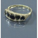 A 9 carat gold sapphire set ring, the sapphire of love heart shape 2.