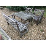 A Charles Verey lattice back bench and garden chairs bearing labels "Charles Verey Collection"