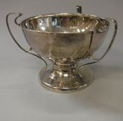 An Edwardian silver pedestal bowl in the Arts & Crafts taste,