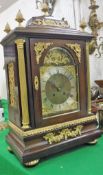 A circa 1900 mahogany cased and gilt brass embellished mantel clock,