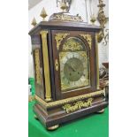 A circa 1900 mahogany cased and gilt brass embellished mantel clock,