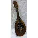 A circa 1900 mandolin with label to interior inscribed "Stridente fabrica di mandolini Via Antonio