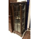 A circa 1900 mahogany bijouterie cabinet or vitrine in the Louis XV style,