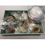 A box of assorted costume jewellery