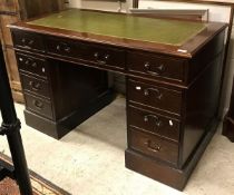 A modern mahogany kneehole pedestal desk with matching filing cabinet and a modern mahogany open