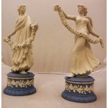 A pair of Wedgwood Jasperware figures from The Dancing Hours Collection by Ivy Garland, No'd.