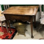 An 18th Century walnut and cross-banded lowboy, the plain top above single drawer to shaped apron,