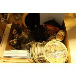 A box containing assorted collectors plates to include Wedgwood,