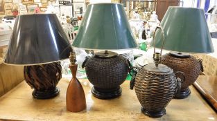 Four various modern canework based table lamps and a turned wooden table lamp CONDITION