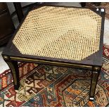 A 19th Century rosewood cane seated stool in the manner of Thomas Hope raised on square tapered and