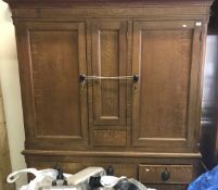 A Victorian painted pine wardrobe with original simulated oak paintwork