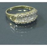 A yellow metal diamond set ring 3.