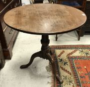 A George III mahogany tea table,