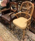 A Victorian mahogany carver chair with leather seat on turned tapering legs together with a a
